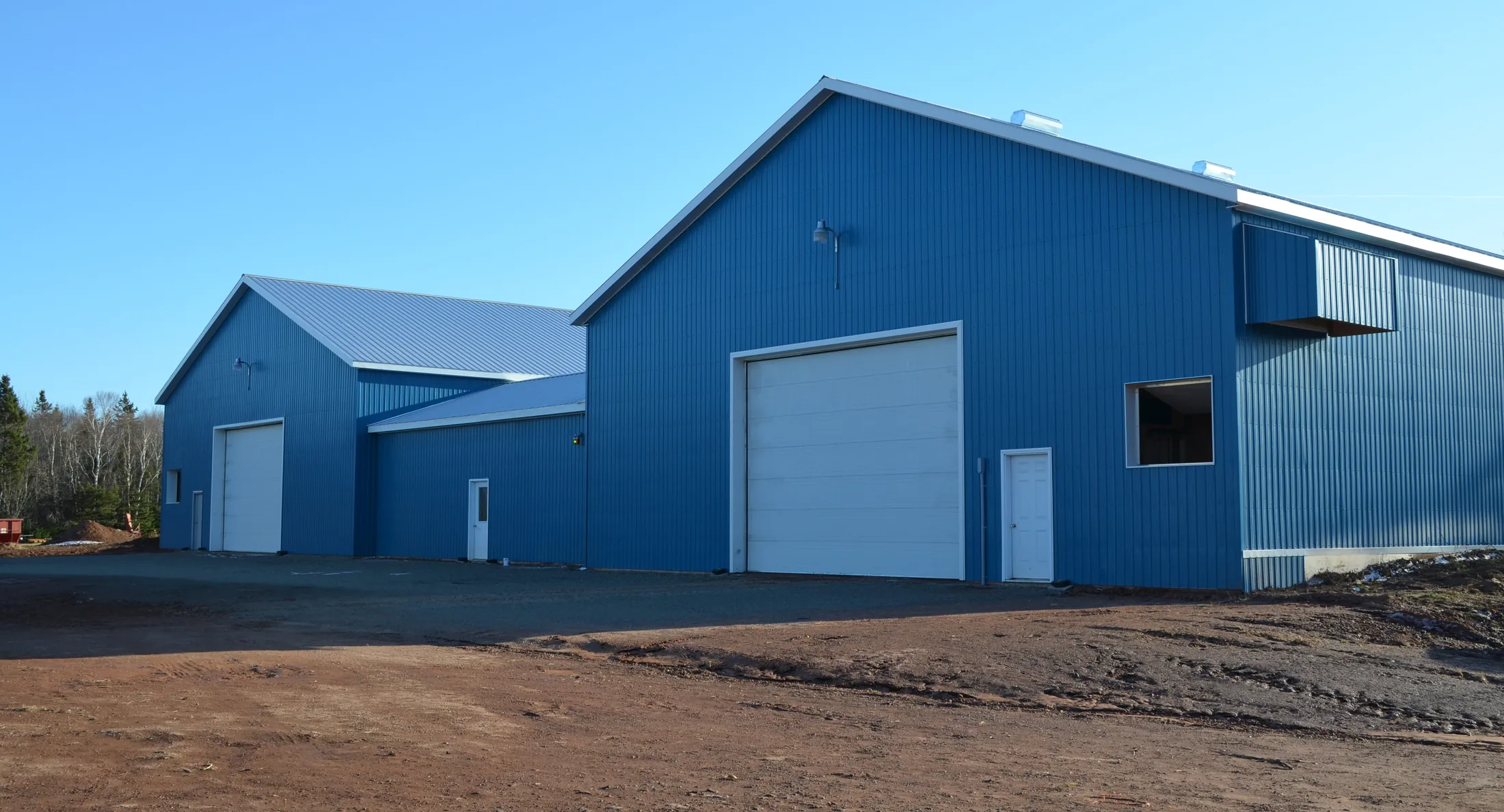 A finished potato storage building clad in blue steel