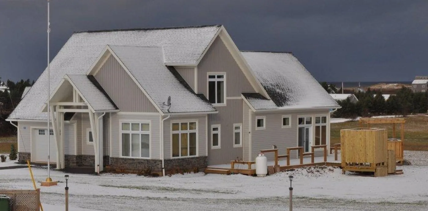 The Morell cottage after BernMar's rebuild, in the snow