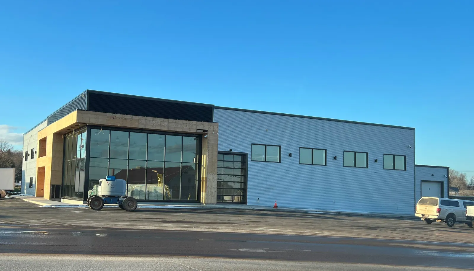 The blue commercial building before BernMar's renovation