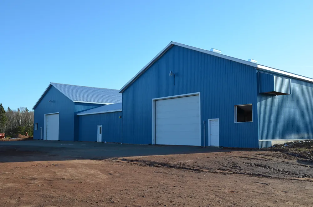 Finished blue steel barn built by BernMar