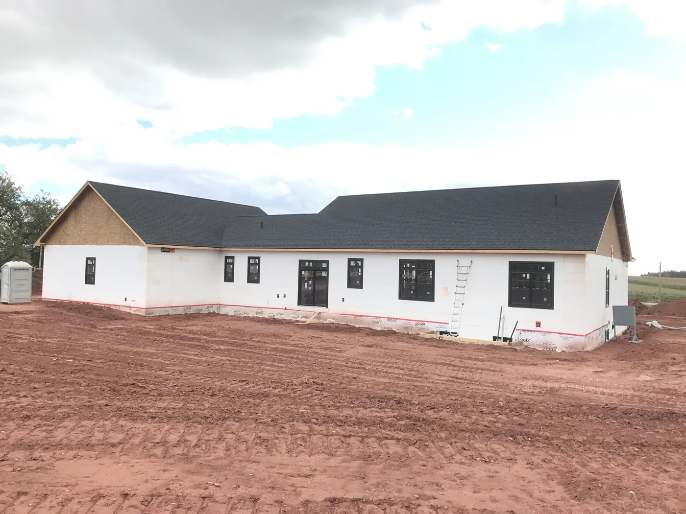 The Pownal home during the build, wrapped and roofed